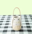 Round wicker basket, 10 pieces of cloth with printed face inside, with ears